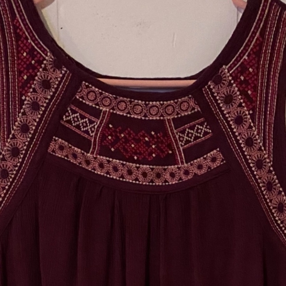 Burgundy dress.
